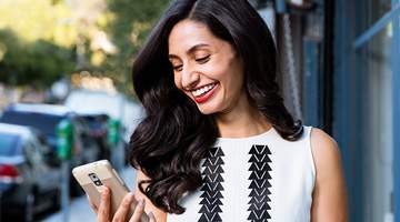 Woman smiling during Invisalign treatment