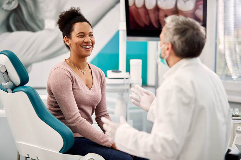 Patient learning about caring for a temporary dental bridge in North York 