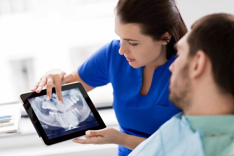 a patient visiting their dentist in North York